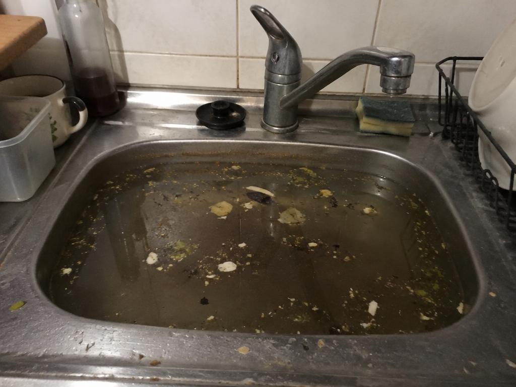 Kitchen Sink Clogged? Causes and Fixes